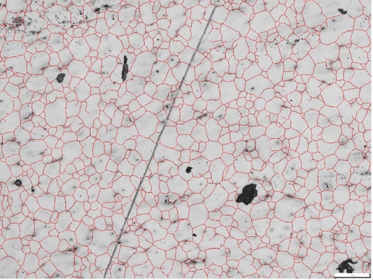 Grain boundaries detected in a metallographic section using deep learning image analysis